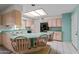 Galley style kitchen with ample counter space and light wood cabinets at 8119 E Desert Trl, Mesa, AZ 85208