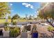 Relaxing backyard oasis with patio furniture and a view of a golf course at 8307 N Vía Rico --, Scottsdale, AZ 85258