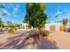 Landscaped front yard with gravel and mature trees at 8307 N Vía Rico --, Scottsdale, AZ 85258