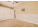 Bedroom with double door closet and neutral walls at 861 E Vaughn Ave, Gilbert, AZ 85234