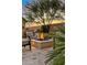 Relaxing outdoor fire pit area with comfortable seating at 8848 E Via Del Sol Dr, Scottsdale, AZ 85255