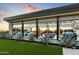 Modern garage with glass walls, showcasing luxury cars at 10101 E Happy Valley Rd, Scottsdale, AZ 85255