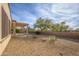 Landscaped backyard with gravel and desert plants at 16933 W Oasis Springs Way, Surprise, AZ 85387