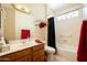 Bathroom with tub, shower, and wood vanity at 16933 W Oasis Springs Way, Surprise, AZ 85387
