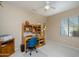 Convenient home office space with built-in shelving and desk at 16933 W Oasis Springs Way, Surprise, AZ 85387