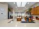 Bright kitchen with stainless steel appliances and an island at 16933 W Oasis Springs Way, Surprise, AZ 85387
