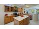 Well-equipped kitchen featuring an island and ample cabinetry at 16933 W Oasis Springs Way, Surprise, AZ 85387