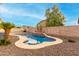 Stunning kidney shaped pool with swim up bar at 17881 W Larkspur Dr, Surprise, AZ 85388