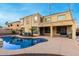 Inviting kidney-shaped pool with ample patio space at 17881 W Larkspur Dr, Surprise, AZ 85388