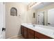 Clean bathroom with double vanity and large mirror at 17881 W Larkspur Dr, Surprise, AZ 85388