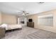 Secondary bedroom with window coverings and neutral decor at 17881 W Larkspur Dr, Surprise, AZ 85388