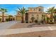 Two-story house with a landscaped yard, large windows, and a three-car garage at 17881 W Larkspur Dr, Surprise, AZ 85388