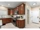 Well-equipped kitchen with granite counters and wood cabinets at 17881 W Larkspur Dr, Surprise, AZ 85388