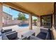 Relaxing patio furniture with views of the pool and backyard at 17881 W Larkspur Dr, Surprise, AZ 85388