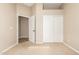 Spacious bedroom with double door closet and carpet at 18650 N 91St Ave # 1401, Peoria, AZ 85382