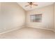 Neutral bedroom with carpet flooring and window with blinds at 18650 N 91St Ave # 1401, Peoria, AZ 85382