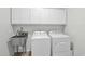 Laundry room with washer, dryer, and utility sink at 18758 W Shangri La Rd, Surprise, AZ 85388