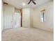 Well-lit bedroom with carpet flooring and good closet space at 19028 E Picacho Rd, Rio Verde, AZ 85263