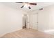 Bedroom with mirrored closet doors and access to a hallway bathroom at 2023 E Willow Wick Rd, Gilbert, AZ 85296