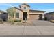 Modern single-story home with two-car garage and desert landscaping at 21315 N 59Th Ter, Phoenix, AZ 85054