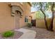 Front entry of townhome with gate and walkway at 2150 E Bell Rd # 1132, Phoenix, AZ 85022