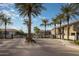 Gated entrance to the community with palm trees at 280 S Evergreen Rd # 1270, Tempe, AZ 85288