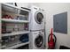 Stackable washer and dryer, shelving for storage at 280 S Evergreen Rd # 1270, Tempe, AZ 85288