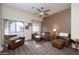 Spacious living room with leather seating and access to balcony at 280 S Evergreen Rd # 1270, Tempe, AZ 85288