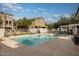 Community pool with surrounding lounge chairs at 280 S Evergreen Rd # 1270, Tempe, AZ 85288