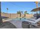 Inviting pool area with lounge chairs and fire pit at 3314 W Altadena Ave, Phoenix, AZ 85029