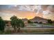 Scenic view of houses and mountains at sunset at 33242 N Jamie Ln, San Tan Valley, AZ 85144