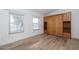 Bedroom with wood-look floors and built-in murphy bed at 3956 N 151St Dr, Goodyear, AZ 85395