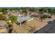 Aerial view of single-story house with a carport and surrounding neighborhood at 544 E Morrow Dr, Phoenix, AZ 85024