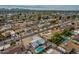 Aerial view showing home's location in a residential neighborhood with pool at 544 E Morrow Dr, Phoenix, AZ 85024