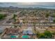 Aerial perspective showcasing a single-story home, pool, and surrounding neighborhood at 544 E Morrow Dr, Phoenix, AZ 85024