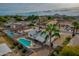 Aerial view showcasing a single-story home's backyard oasis, complete with a sparkling pool at 544 E Morrow Dr, Phoenix, AZ 85024