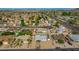 An aerial view of a residential area, highlighting a single-story house with a pool at 544 E Morrow Dr, Phoenix, AZ 85024
