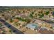 Wide aerial view of a residential neighborhood, featuring a single-story home with a pool at 544 E Morrow Dr, Phoenix, AZ 85024