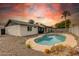 Stunning backyard view at sunset with a pool at 544 E Morrow Dr, Phoenix, AZ 85024