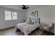 Charming bedroom with a queen bed, ceiling fan, and modern decor at 544 E Morrow Dr, Phoenix, AZ 85024