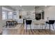 Modern kitchen with white cabinets, quartz countertops and island at 544 E Morrow Dr, Phoenix, AZ 85024