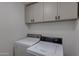 Bright laundry room with updated washer and dryer at 544 E Morrow Dr, Phoenix, AZ 85024
