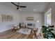 Bright living room with hardwood floors and large windows at 544 E Morrow Dr, Phoenix, AZ 85024