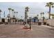 Gated community entrance with a brick paved road and entry sign at 625 W Mckellips Rd # 213, Mesa, AZ 85201