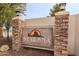 Seyenna Vistas community entrance sign with stone pillars and lighting at 625 W Mckellips Rd # 213, Mesa, AZ 85201