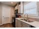 Clean kitchen featuring updated cabinetry and sink at 625 W Mckellips Rd # 213, Mesa, AZ 85201