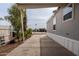 Covered patio area with concrete flooring and access to the backyard at 625 W Mckellips Rd # 213, Mesa, AZ 85201