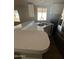 Modern kitchen with speckled countertops and stainless steel appliances at 652 S Ellsworth Rd # 170, Mesa, AZ 85208