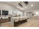 Modern kitchen with white shaker cabinets, quartz countertops, and a large island at 8544 E Heatherbrae Ave, Scottsdale, AZ 85251