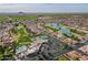 Aerial view of community with pools, tennis courts, and clubhouse at 10633 E Michigan Ave, Sun Lakes, AZ 85248